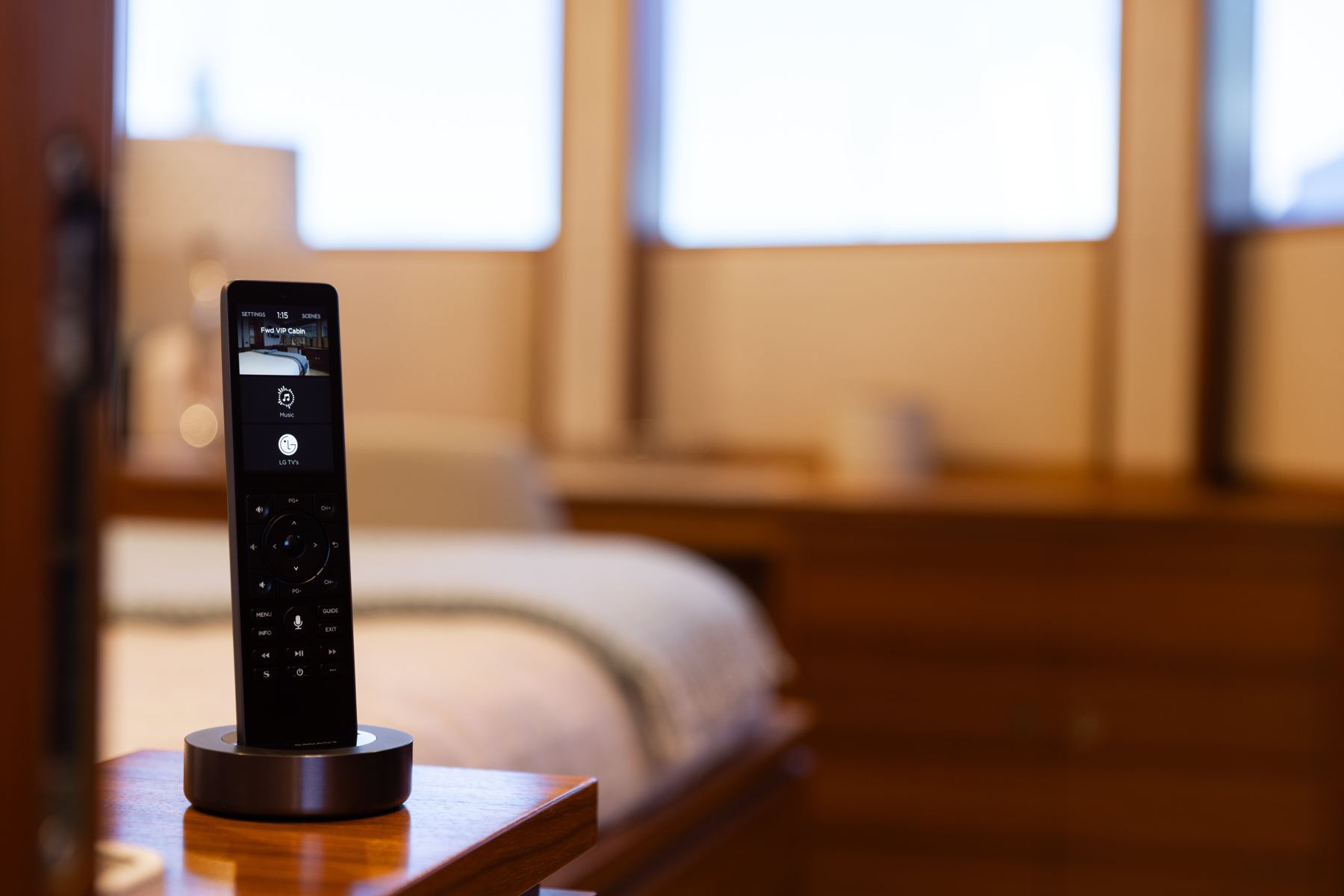 Savant Pro remote in its dock reading Fwd VIP Cabin