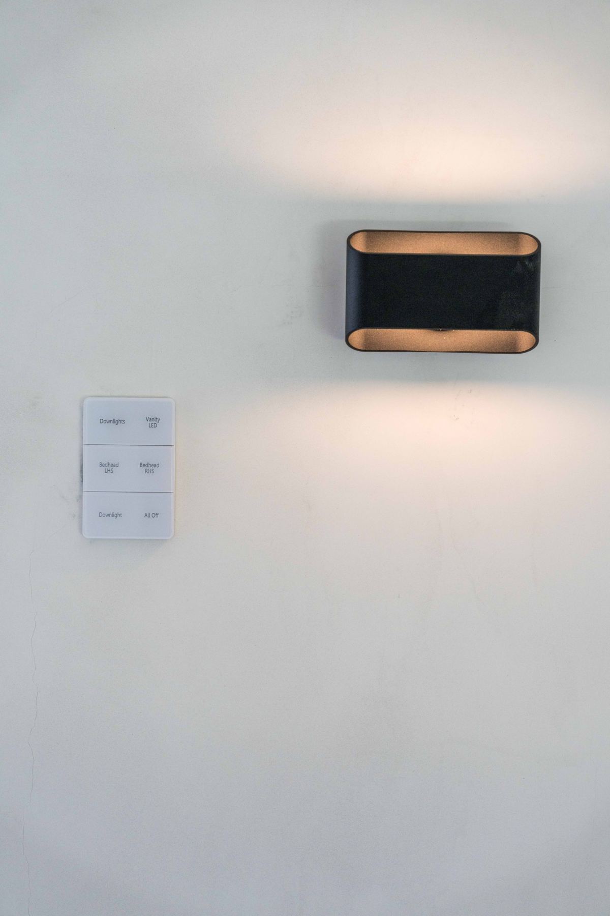Engraved keypad reading Downlights, Vanity LED, Bedhead LHS, Bedhead RHS, Downlight, All Off