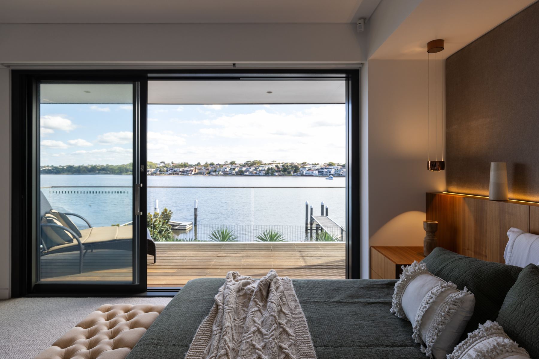 Master bedroom looking out over the water