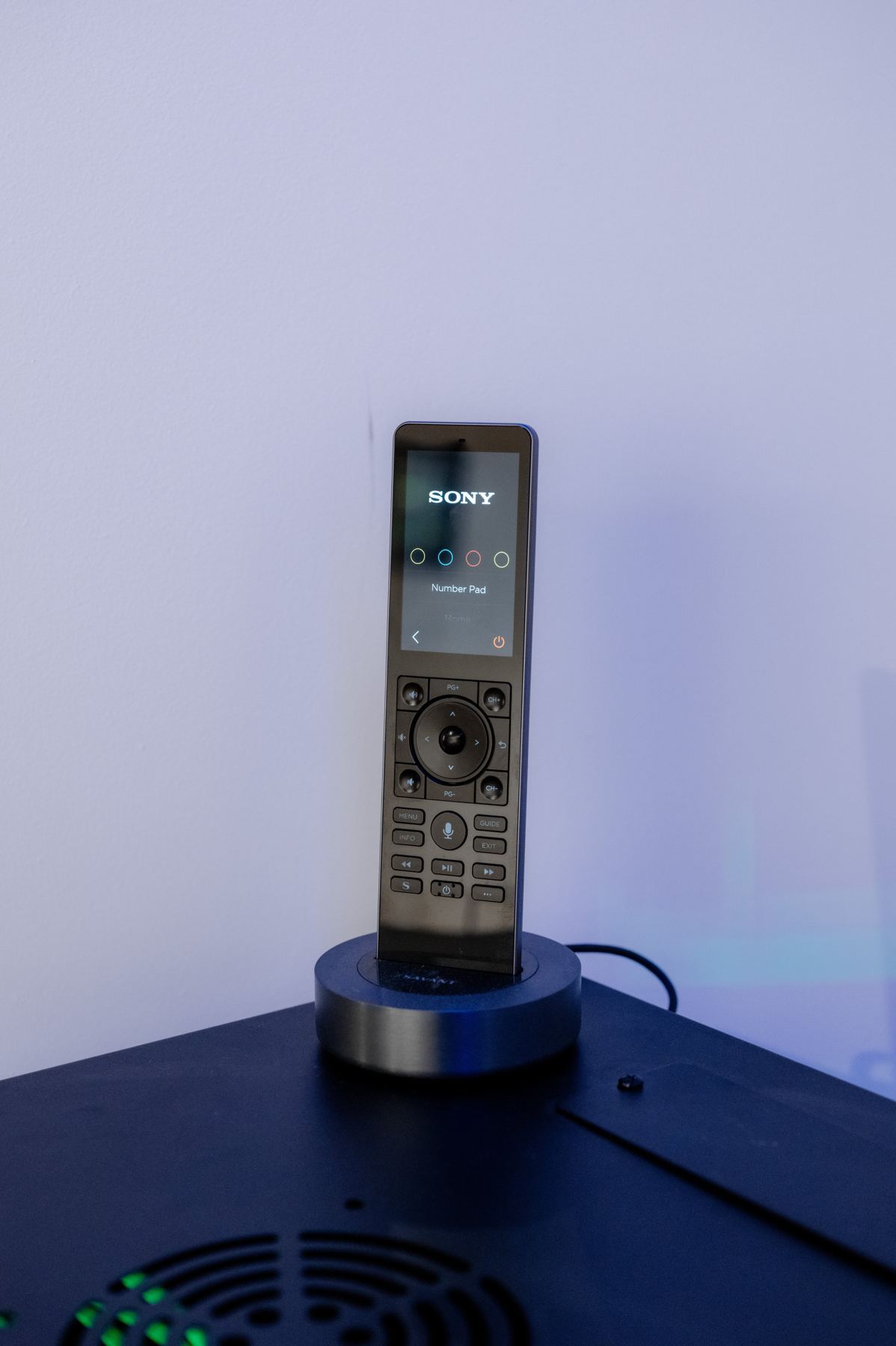 Savant Pro remote in its charging dock